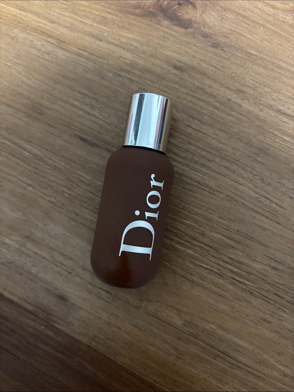 Dior Brown Foundation Bottle with Silver Cap